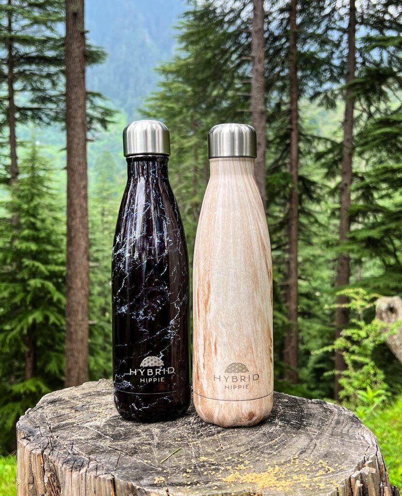 Pink - Stainless Steel Reusable Water Bottle Hybrid Hippie Reusable Bottles from Dubai in a Forest Trail